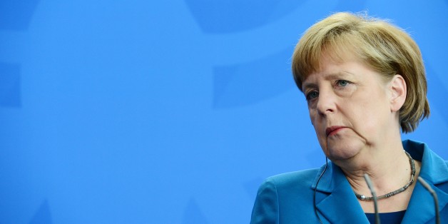 German Chancellor Angela Merkel attends a press conference after talks with the Czech Prime Minister at the Chancellery in Berlin on May 4, 2015. AFP PHOTO / JOHN MACDOUGALL (Photo credit should read JOHN MACDOUGALL/AFP/Getty Images)
