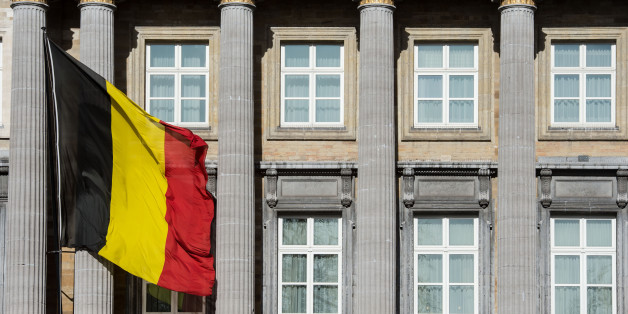 The Belgian flag flies outside the Belgian federal parliament in Brussels, Wednesday Feb. 12, 2014. Belgium, one of the very few countries where euthanasia is legal, is expected to take the unprecedented step this week of abolishing age restrictions on who can ask to be put to death, extending the right to children. The legislation appears to have wide support in the largely liberal country. But it has also aroused intense opposition from foes, including a list of paediatricians, and everyday pe