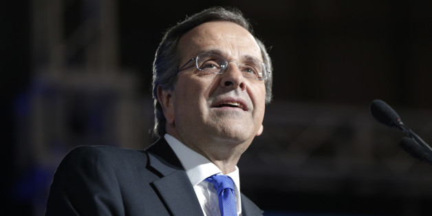 Greece's Prime Minister Antonis Samaras delivers his final campaign speech at the Taekwondo Indoor Stadium in southern Athens on Friday, Jan. 23, 2015. All opinion polls on Sunday's closely-watched national election agree: The radical left opposition Syriza party, which has vowed to rewrite the terms of Greece's international bailout, enjoys a lead of at least 4 percentage points over Prime Minister Antonis Samaras' conservatives. (AP Photo/Lefteris Pitarakis)