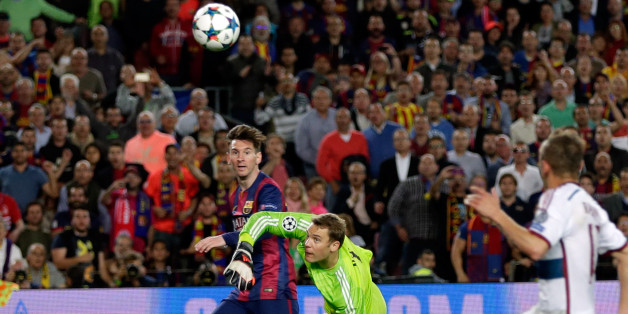 Barcelona's Lionel Messi, left scores his second goal past Bayern's goalkeeper Manuel Neuer during the Champions League semifinal first leg soccer match between Barcelona and Bayern Munich at the Camp Nou stadium in Barcelona, Spain, Wednesday, May 6, 2015. (AP Photo/Emilio Morenatti)