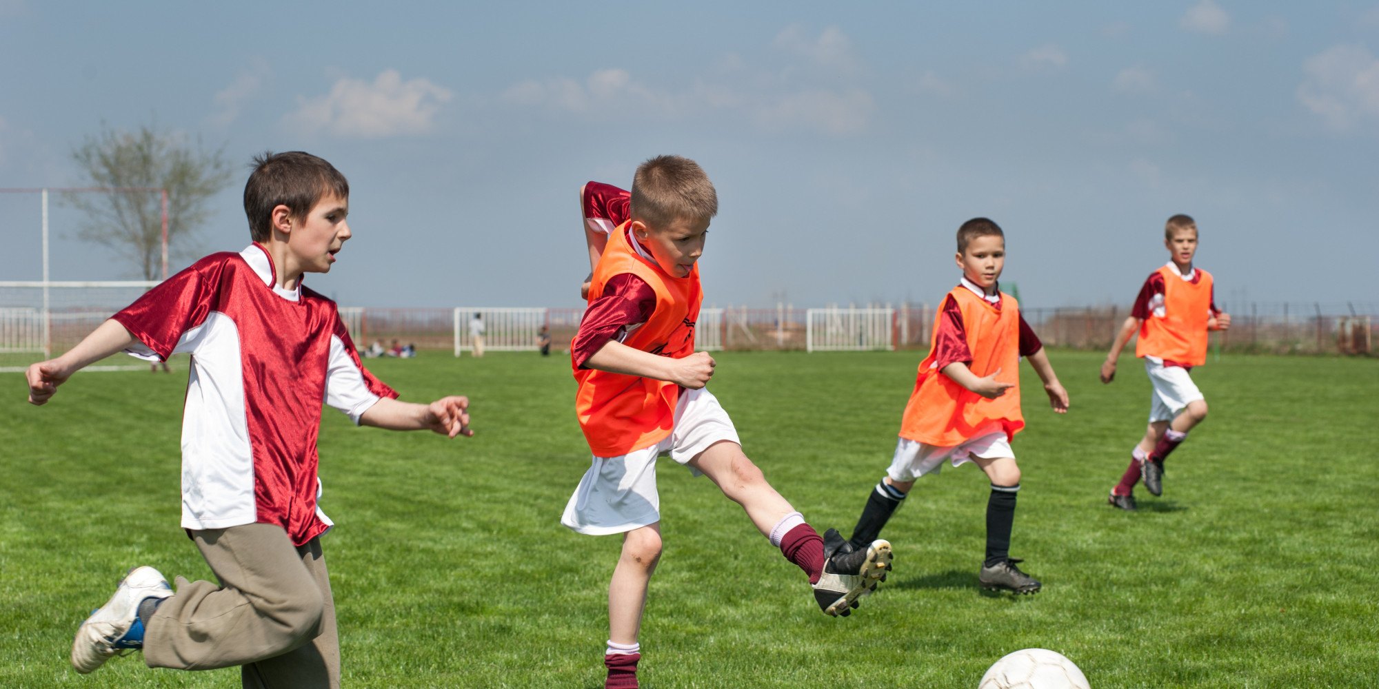 Playing sports is a great. Дети играют в футбол. Мальчик играет в футбол. Мальчишки играют в футбол. Парень играет в футбол.