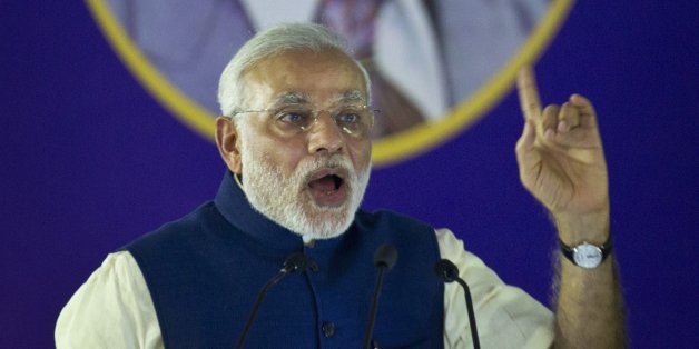 Indian Prime Minister Narendra Modi speaks after unveiling the foundation stone for an international center dedicated to Ambedkar, in New Delhi, India, Monday, April 20, 2015. Ambedkar, an untouchable, or Dalit, and a prominent Indian freedom fighter, was the chief architect of the Indian Constitution, which outlawed discrimination based on caste.(AP Photo/Saurabh Das)