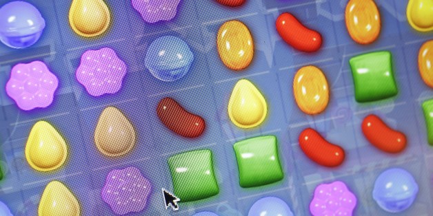 A detail from the online game "Candy Crush Saga" is shown on a computer screen, Monday, March 24, 2014 in New York. King Digital, the company behind the popular, addictive mobile is expected to begin trading on the New York Stock Exchange on March 26. The Dublin, Ireland-based company could be valued as high as $7.6 billion if its initial public offering prices at $24 per share, the upper end of its expected range. (AP Photo/Mark Lennihan)