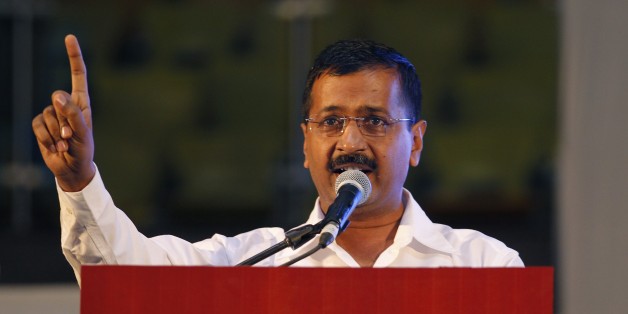 Delhi Chief Minister Arvind Kejriwal addresses a gathering after launching an anti-corruption helpline in New Delhi, India, Sunday, April 5, 2015. (AP Photo/Altaf Qadri)