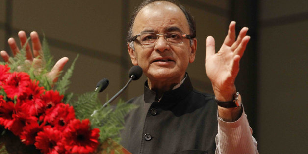 Indian Finance Minister Arun Jaitley speaks during a conference on âRegulatory Framework for International Financial Services Centre (IFSC) in Indiaâ, in Gandhinagar, India, Friday, April 10, 2015. Jaitley announced rules and regulations for foreign and domestic financial services companies who wish to set up operations at India's first IFSC. (AP Photo/Ajit Solanki)