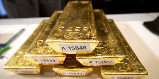 Bars of gold are piled up during a press conference at the German Federal Bank in Frankfurt am Main, western Germany, on January 16, 2013.The German central Bundesbank said it will relocate parts of its gold stored abroad following recent accusations that it is not keeping proper track of its vast reserves.AFP PHOTO / FRANK RUMPENHORST GERMANY OUT (Photo credit should read FRANK RUMPENHORST/AFP/Getty Images)