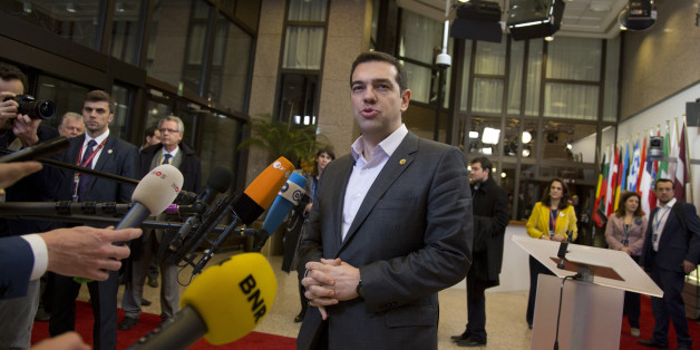 Greek Prime Minister Alexis Tsipras speaks with the media during an EU summit in Brussels on Friday, March 20, 2015. German Chancellor Angela Merkel said Thursday that Greece has no choice but to carry out economic reforms if it wants to receive more financial aid, dashing any hopes Athens might have had for a softening in Berlin's stance. (AP Photo/Virginia Mayo)