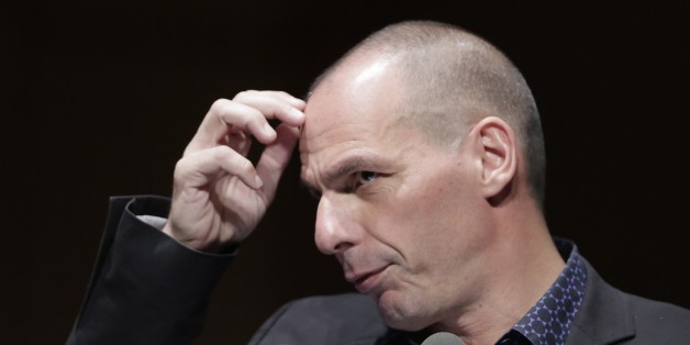 Greek Finance Minister Yanis Varoufakis gestures during his speech at a financial conference in Athens, on Tuesday, May 19, 2015. Market anxiety eased in Greece on Tuesday after the country's finance minister said he was confident of reaching a deal with bailout creditors as soon as next week. (AP Photo/Petros Giannakouris)
