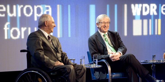 German finance minister Wolfgang Schaeuble (L) and prime minister of Luxemburg Jean-Claude Juncker (R) take part in a panel discussion during the WDR (West Deutche Rundfunk) Europe forum conference at the foreign ministry in Berlin on May 16, 2013. AFP PHOTO / ODD ANDERSEN (Photo credit should read ODD ANDERSEN/AFP/Getty Images)