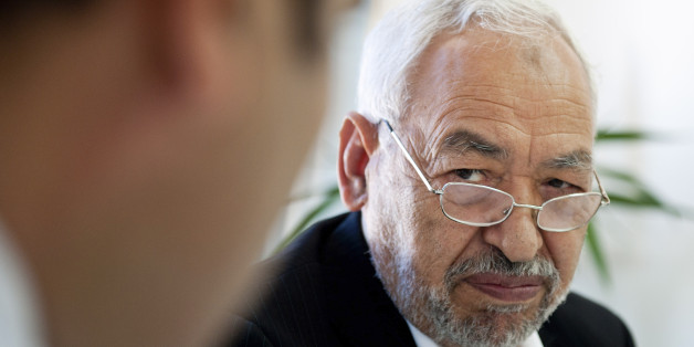 Tunisian leader and founder of the moderate islamist party Ennahda, Rached Ghannouchi, chairs an executive board at the party's headquarters in Tunis, Thursday, Oct. 27, 2011. Authorities say the latest results from Tunisia's landmark elections indicate the moderate Islamist party is holding onto its lead, taking at least 44 percent of seats counted so far for an assembly tasked with writing a new constitution. (AP Photo/Benjamin Girette)