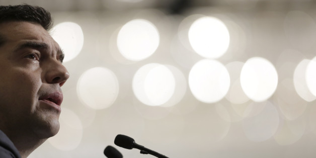 Greece's Prime Minister Alexis Tsipras gives a speech during an economic conference in Athens, on Friday, May 15, 2015. Tsipras said that his country's left-wing government is "very close" to reaching a vital deal with bailout lenders, but insists there is "no possibility of retreat" on demands to further axe pensions and wages.(AP Photo/Petros Giannakouris)