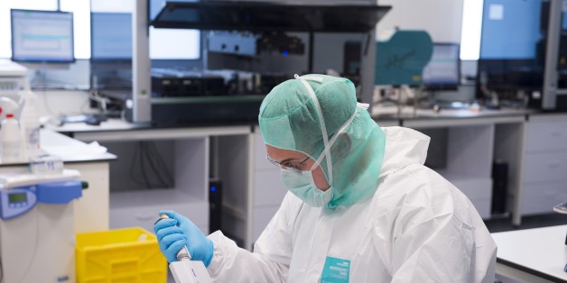 Forensic scientists of the Criminal Research Institute of the National Gendarmerie (IRCGN), collects DNA, on May 19, 2015 in Pontoise, outside Paris. A scanner for autopsies, a collection of 8,000 weapons, 'data-gendarmes' to predict the evolution of delinquency: the gendarmerie includes hundreds of 'experts' in a brand new judicial center in the Val-d'Oise. AFP PHOTO MARTIN BUREAU (Photo credit should read MARTIN BUREAU/AFP/Getty Images)