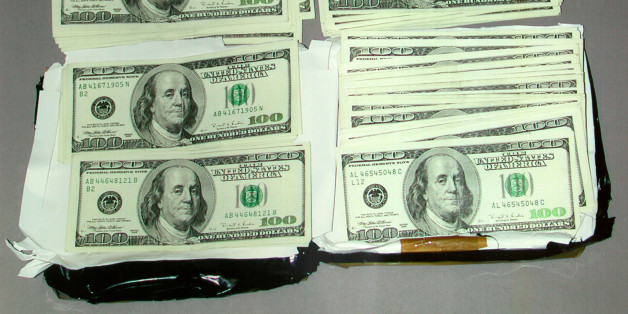 385795 02: FILE PHOTO: Undated file photo released by the FBI February 20, 2001 shows a package recovered at the 'Lewis' drop site containing $50,000 cash allegedly left by Russians for FBI Agent Robert Philip Hanssen. Hanssen was arrested two days ago and accused of spying for Russia, allegedly giving the KGB the names of three Russian intelligence agents working for the United States, the FBI said in a press conference today. (Photo courtesy of FBI/Newsmakers)