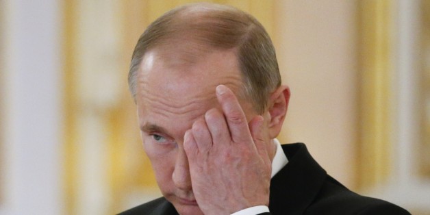 Russia's President Vladimir Putin attends a ceremony of receiving diplomatic credentials from foreign ambassadors at the Kremlin in Moscow on May 28, 2015. AFP PHOTO / POOL / SERGEI KARPUKHIN (Photo credit should read SERGEI KARPUKHIN/AFP/Getty Images)