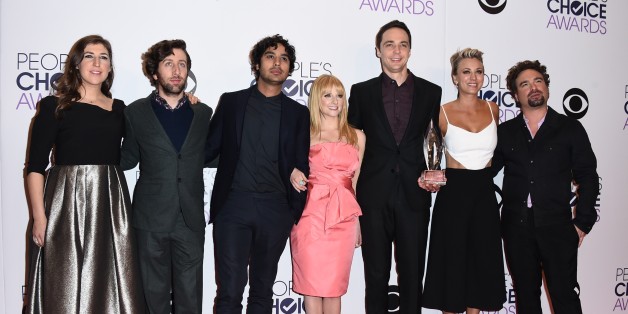 Mayim Bialik, from left, Simon Helberg, Kunal Nayyar, Melissa Rauch, Jim Parsons, Kaley Cuoco- Sweeting and Johnny Galecki, from the cast of "The Big Bang Theory," winners of the award for favorite TV show, pose in the press room at the People's Choice Awards at the Nokia Theatre on Wednesday, Jan. 7, 2015, in Los Angeles. (Photo by Jordan Strauss/Invision/AP)