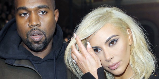 Kanye West and Kim Kardashian arrive for Lanvin's ready-to-wear Fall-Winter 2015/2016 fashion collection, part of the Paris Fashion Week, Thursday March 5, 2015 in Paris, France. (AP Photo/Jacques Brinon)