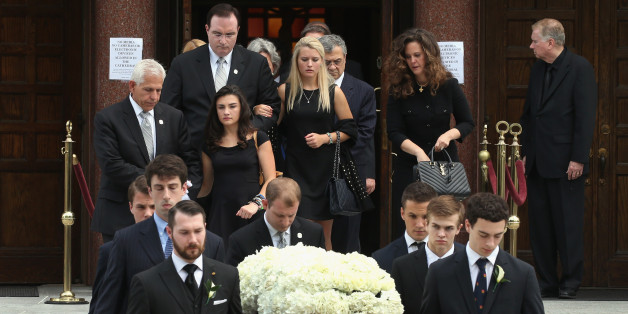 WASHINGTON, DC - JUNE 01: Surviving daughters Katerina Marie Savopoulos (C) and Abigal Marie Savopoulos (L) folllow behind the casket of their 10-year old brother Philip Savopoulos after a funeral service the Saint Sophia Greek Orthodox Cathedral June 1, 2015 in Washington, DC. The funeral service was held for Savvas Savopoulos, 46, his wife, Amy, 47, and their 10 year old son, Philip who were murdered along with their housekeeper, Veralicia Figueroa, 57, who was killed with them. Darron Dellon Dennis Wint, was arrested and being held without bond for thier murders. (Photo by Mark Wilson/Getty Images)