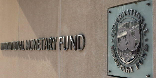 (FILES): This April 5, 2007 file photo shows the International Monetary Fund logo at IMF headquarters on Pennsylvania Avenue in Washington, DC. The IMF announced November 2, 2009 the sale of 200 tonnes of gold to India's central bank, nearly half the amount targeted for sale over the coming years to shore up IMF finances. The total sales proceeds are equivalent to 6.7 billion dollars, the IMF said. AFP PHOTO / Files / TIM SLOAN (Photo credit should read TIM SLOAN/AFP/Getty Images)