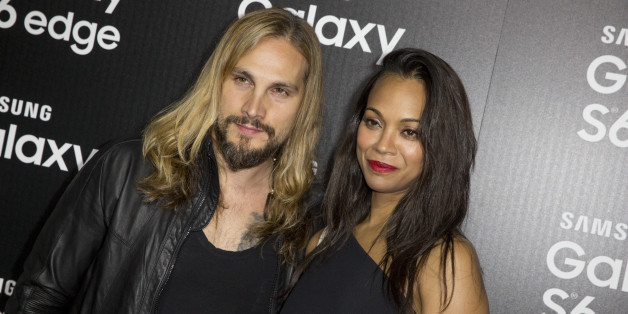 Marco Perego, left, and Zoe Saldana arrive at the Launch Of The Samsung Galaxy S6 And The Galaxy S6 Edge at Quixote Studios on Thursday, April 2, 2015, in West Hollywood, Calif. (Photo by Rich Fury/Invision/AP)