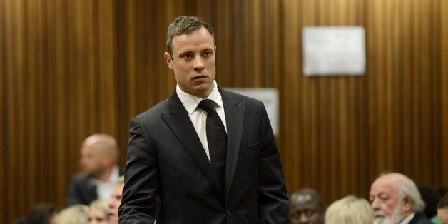 BY COURT ORDER, THIS IMAGE IS FREE TO USE.
PRETORIA, SOUTH AFRICA - OCTOBER 21 (SOUTH AFRICA OUT): Oscar Pistorius arrives in the Pretoria High Court for sentencing in his murder trial on October 21, 2014, in Pretoria, South Africa. Judge Thokozile Masipa will hand down her sentence today in the Oscar Pistorius murder trial. She found Pistorius not guilty of murdering his girlfriend Reeva Steenkamp, but convicted him of culpable homicide. (Photo by Herman Verwey/Foto24/Gallo Images/Getty Images)