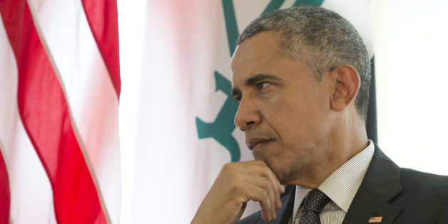 US President Barack Obama pauses as he participates in a bilateral meeting with Iraqi Prime Minister Haider al-Abadi during the G-7 summit in Schloss Elmau hotel near Garmisch-Partenkirchen, southern Germany, Monday, June 8, 2015. (AP Photo/Carolyn Kaster)