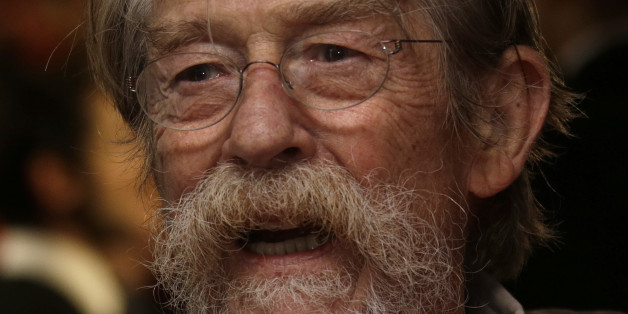 John Hurt poses for photographers at the premiere for the film Fury, which closes the BFI London Film Festival, at the Odeon cinema in central London, Sunday, Oct. 19, 2014. (Photo by Joel Ryan/Invision/AP)