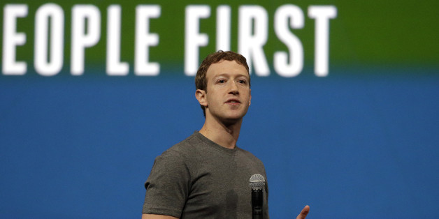 Facebook CEO Mark Zuckerberg gestures while delivering the keynote address at the f8 Facebook Developer Conference Wednesday, April 30, 2014, in San Francisco. (AP Photo/Ben Margot)