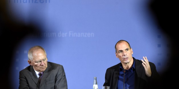 Greece's new Finance Minister Yanis Varoufakis (R) and his German counterpart Wolfgang Schaeuble (L) attend a joint press conference following their meeting on February 5, 2015 at the Finance ministry in Berlin. The new Greek finance minister's stop in Berlin follows a high-stakes visit to ECB headquarters in Frankfurt to try to drum up support for the new anti-austerity government's debt relief bid.
AFP PHOTO / ODD ANDERSEN (Photo credit should read ODD ANDERSEN/AFP/Getty Images)
