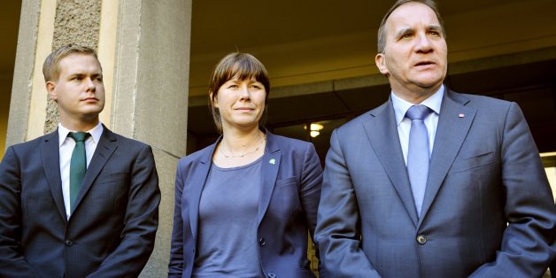 Green Party spokespersons Gustav Fridolin, left, Asa Romson, centre, and leader of Sweden's Social Democrats Stefan Lofven pose for photographer Monday Sept. 15, 2014. Lofven announced that he will form a government together with the Green Party. (AP Photo/ Henrik Montgomery) SWEDEN OUT