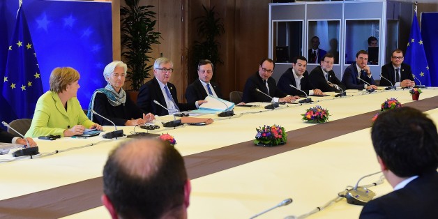 (R-L) Finland's Prime Minister Juha Sipila, Estonia's Prime Minister Taavi Roivas, Spain's Prime Minister Mariano Rajoy Brey, Greek Prime Minister Alexis Tsipras, French President Francois Hollande, European Central Bank President Mario Draghi, European Commission President Jean-Claude Juncker, IMF Managing Director Christine Lagarde, German Chancellor Angela Merkel meet during an emergency leaders summit on Greece at the European Council in Brussels, June 22, 2015. AFP PHOTO / EMMANUEL DUNAND (Photo credit should read EMMANUEL DUNAND/AFP/Getty Images)