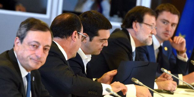 French President Francois Hollande, second left, speaks with Greek Prime Minister Alexis Tsipras, center, during a meeting with other eurogroup heads of state at an EU summit in Brussels on Monday, June 22, 2015. Heads of state in the eurogroup meet in Brussels Monday for a special summit to discuss the financial crisis with Greece. (AP Photo/Geert Vanden Wijngaert)