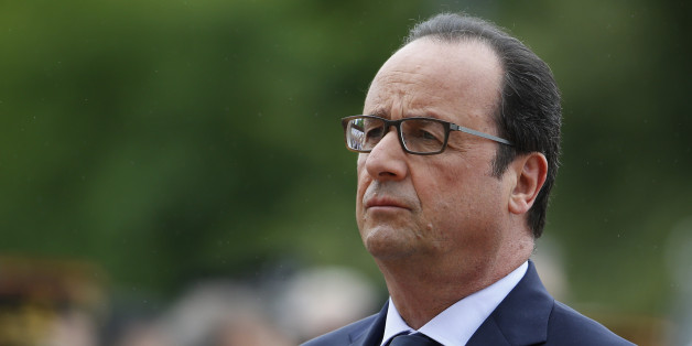 French President Francois Hollande is pictured during a ceremony to commemorate General de Gaulle's "Appeal of June 18th" during World War II, Thursday, June 18, 2015, in Suresnes, near Paris, France. In his famous appeal, De Gaulle exhorted the French to resist the German occupation. (Thomas Samson, Pool via AP)