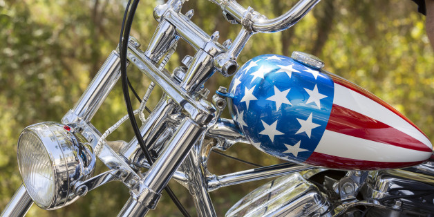 This Thursday, Sept. 4, 2014 photo shows a detail of the Captain America chopper Peter Fonda rode in âEasy Riderâ at the Profiles in History auction house in Calabasas, Calif. Itâs one of the most recognizable motorcycles of all time. The auction house Profiles in History tells The Associated Press it estimates the Harley-Davidson will bring between $1 million and $1.2 million at its Oct. 18, 2014 sale. (AP Photo/Damian Dovarganes)