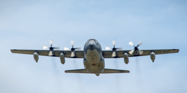 An HC-130P Combat King flies overhead at Moody Air Force Base, Ga., Aug. 5, 2014. The aircraft and the Airmen onboard returned to Moody after a five-month deployment in support of Air Forces Africa, completing the final deployment for active-duty HC-130Ps. The aircraft and its crew are assigned to the 71st Rescue Squadron. (U.S. Air Force photo by Airman 1st Class Ryan Callaghan/Released)