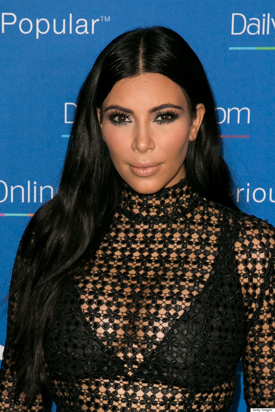 Kim Kardashian Attends Yacht Party In Naked Dress