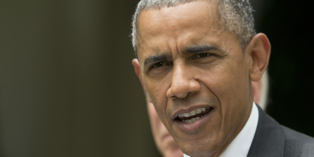 President Barack Obama, accompanied by Vice President Joe Biden, speaks in the Rose Garden of the White House, Thursday, June 25, 2015, after the U.S. Supreme Court upheld the subsidies for customers in states that do not operate their own exchanges under President Barack Obama's Affordable Care Act. (AP Photo/Pablo Martinez Monsivais)