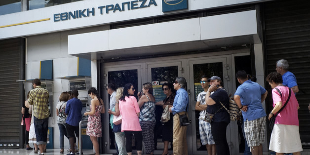 ATHENS, GREECE - JUNE 27: Greeks queue in front of the National Bank to use ATM to withdraw cash as Parliament holds an emergency session for the government's proposed referendum June 27, 2015 in Athens, Greece. Greece's fraught bailout talks with its creditors took a dramatic turn early Saturday, with the radical left government announcing a referendum in just over a week on the latest proposed deal . (Photo by Milos Bicanski/Getty Images)