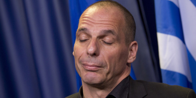 Greek Finance Minister Yanis Varoufakis answers questions during a media conference after a meeting of eurogroup finance ministers in Brussels on Saturday, June 27, 2015. Anxiety over Greece's future swelled on Saturday after Prime Minister Alexis Tsipras' call to have the people vote on a proposed bailout deal. (AP Photo/Virginia Mayo)