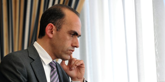Cyprus' Minister of Finance Harris Georgiades pauses during an interview with AFP at the Ministry of Finance on March 12, 2015 in the capital Nicosia. Cyprus will not need all of the 10-billion-euro bailout it received in 2013 as its economy recovers faster than expected, the country's finance minister has told AFP. '(The economy) is much better, but I'm not saying that it is good,' Georgiades said ahead of the second anniversary of the 'unprecedented crisis' that shook Eurozone and left the Me