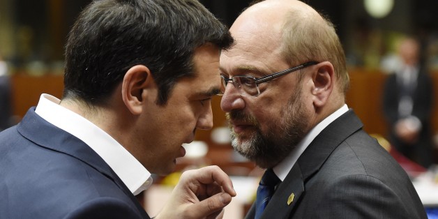 Greek prime minister Alexis Tsipras (L), talks with European parliament president Martin Schulz, before a round table meeting as part on an EU summit at the EU headquarters in Brussels on June 25, 2015. Talks between eurozone finance ministers broke up without agreeing on a Greek debt deal, with a new meeting due in coming days, Finland's Alexander Stubb said. AFP PHOTO/ ALAIN JOCARD (Photo credit should read ALAIN JOCARD/AFP/Getty Images)