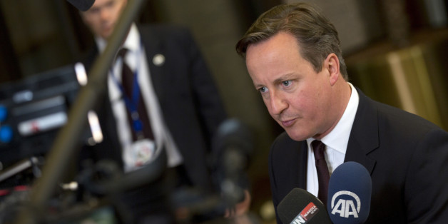 British Prime Minister David Cameron speaks with the media after an EU summit in Brussels on Friday, June 26, 2015. European leaders have tasked finance ministers from the euro countries with concluding a debt financing agreement with Greece over the weekend, just days before Athens has to meet a crucial debt deadline. (AP Photo/Virginia Mayo)