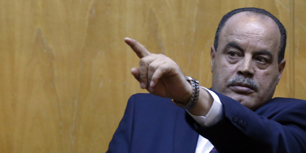Tunisian Interior Minister Mohamed Najem Gharsalli gestures during a press conference in Imperial Marhaba hotel in Sousse, Tunisia, Monday, June 29, 2015, the scene of Friday's beach massacre. The top security officials of Britain, France, Germany and Belgium are paying homage to the people killed in the beach terrorist attack on Friday. (AP Photo/Darko Vojinovic)