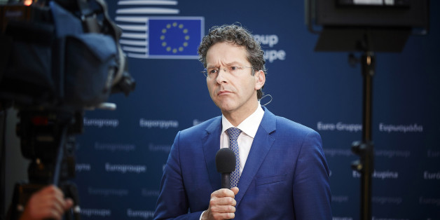 Dutch Finance Minister and chair of the eurogroup Jeroen Dijsselbloem listens to reporters in the Dutch parliament after a teleconference of the 19 eurozone finance ministers in The Hague, Netherlands on Tuesday, June 30, 2015. Dijsselbloem, says "it would be crazy to extend" the Greek bailout beyond its midnight expiration since Greece won't accept the European proposals on the table. He said that a Greek request for a new European aid program would be considered later. (AP Photo/Phil Nijhuis)