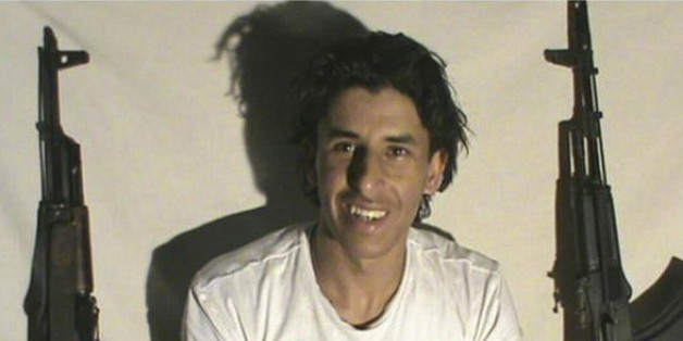 This image taken from a militant website associated with Islamic State extremists, posted Saturday, June 27, 2015, purports to show Tunisian gunman Seifeddine Rezgui who killed tens of people in the Tunisian beach resort of Sousse on Friday. (Militant photo via AP)
