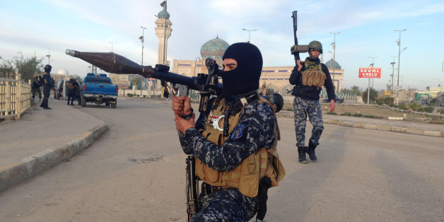 FILE - In this Saturday, Feb. 1, 2014, file photo, Iraqi security forces patrol in Ramadi, Iraq. More than a month after jihadist militants seized control of parts of Iraqâs western Anbar province, an unsettling realization is sinking in: Iraqâs government could face a tougher time beating back an insurgency there than the hard slog the Americans faced last decade. The reasons include a deep distrust of the government by Iraqi Sunnis, insufficient resources, sectarian tensions enflamed by the war in Syria and divisions among the tribes that make up Anbarâs social fabric. (AP Photo, File)