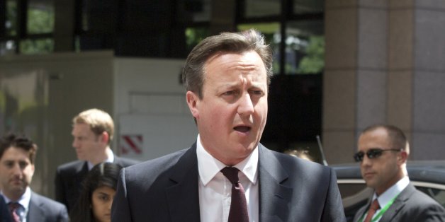 British Prime Minister David Cameron arrives for an EU summit in Brussels on Thursday, June 25, 2015. Greece and its creditors launched a new round of talks in Brussels early Thursday in a fresh bid to unlock billions of euros in loans and save the country from bankruptcy. (AP Photo/Virginia Mayo)