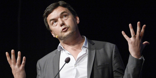FILE - In this June 30, 2014 file photo, French economist Thomas Piketty speaks during his seminar at the Almedalen political week in Visby on the island of Gotland, in Sweden. Novelist Marilynne Robinson, economist Piketty and cartoonist Roz Chast are among the finalists for National Book Critics Circle prizes. The 30 nominees for six competitive categories were announced Monday, Jan. 19, 2015. (AP Photo/Janerik Henriksson, File) SWEDEN OUT