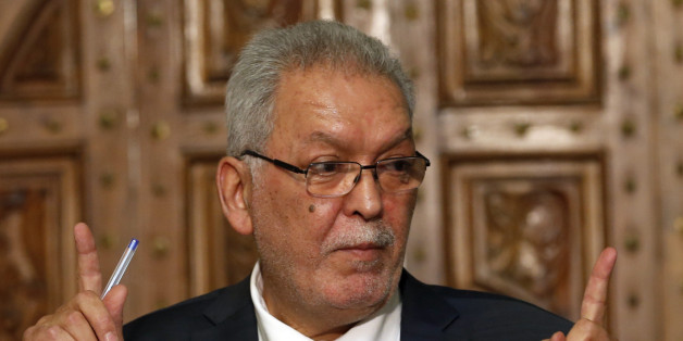 Kamel Jendoubi, Minister to the Prime Minister in charge of Relations with Constitutional Bodies and the Civil Society, gestures during a press conference in Tunis, Tunisia, Thursday, July 2, 2015. The Islamic State group claimed responsibility for the attack, in which a Tunisian student opened fire on a beach in the resort of Sousse. The attacker was later killed by police. (AP Photo/Darko Vojinovic)