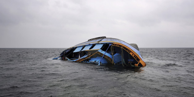 A capsized ship that originated from Libya and which according to the United Nations refugee agency was transporting an estimated 850 refugees, lies on a sandbar 35 kilometers (22 miles) north of the Tunisian islands of Kerkennah, Saturday, June 4, 2011. The Geneva-based agency said Friday at least 578 of the estimated 850 people on board, mostly from West Africa, Pakistan and Bangladesh, survived the Wednesday sinking, making it one of the worst and deadliest incidents in the Mediterranean so far this year. (AP Photo/Lindsay Mackenzie)