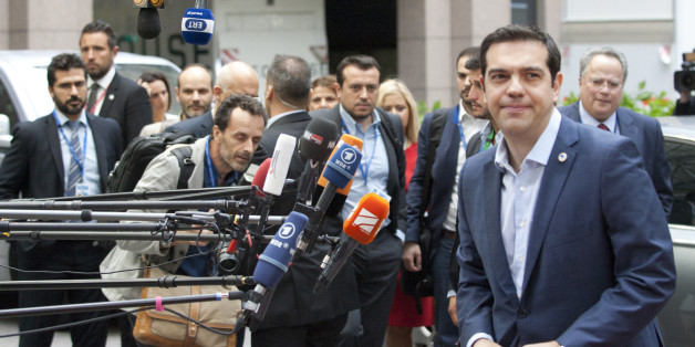 Greek Prime Minister Alexis Tsipras arrives for a meeting of eurozone heads of state at the EU Council building in Brussels on Sunday, July 12, 2015. Greece has another chance Sunday to convince skeptical European creditors that it can be trusted to enact wide-ranging economic reforms which would safeguard its future in the common euro currency. (AP Photo/Francois Walschaerts)